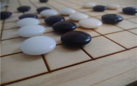 Go board with stones